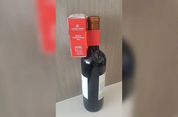 Jackon Triggs wine bottle with promotional hang tag